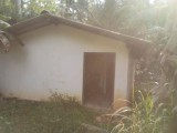 Land with house for sale in Urapola