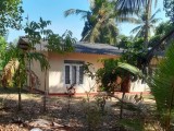 Land with three houses for sale from Kadawatha