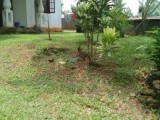 Land with a two storied house for sale