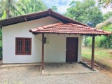 Land with a house for sale from Gampaha