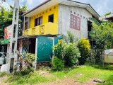 Land with a Building For Sale Or Rent (පානදුර)