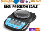 Laboratory precision balance with zero adjustment knob
