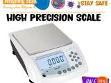 Laboratory precision balance with zero adjustment knob