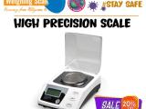 Laboratory precision balance with zero adjustment knob